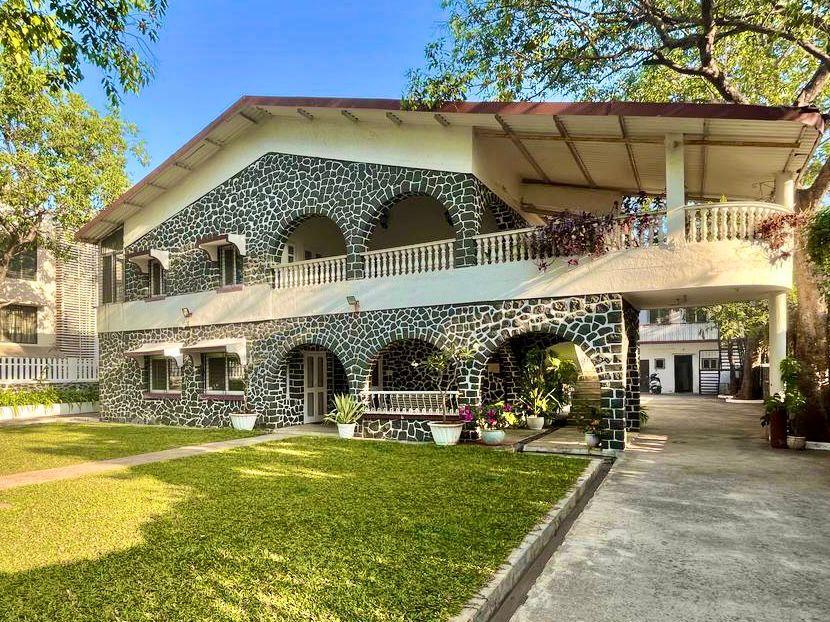 Eternelle Bungalow front view with lawn in Lonavala