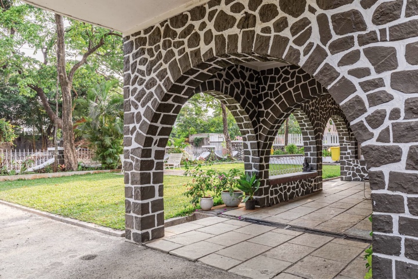 Stone arches and outdoor space at Eternelle Bungalow
